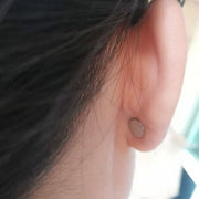 Boucles d'oreilles noires point d'acupuncture magnétique
